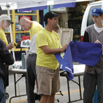 Volunteers help set up